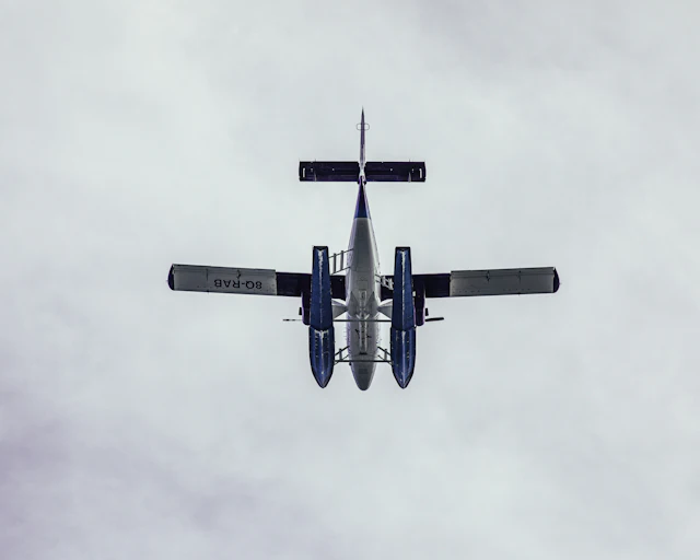 Airplane in the sky — photograph by Ibrahim Ifaaz, Maldives