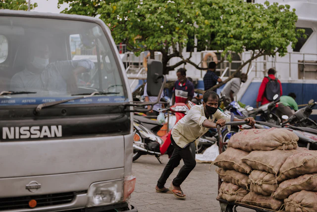 People walking, daytime — photograph by Ibrahim Ifaaz
