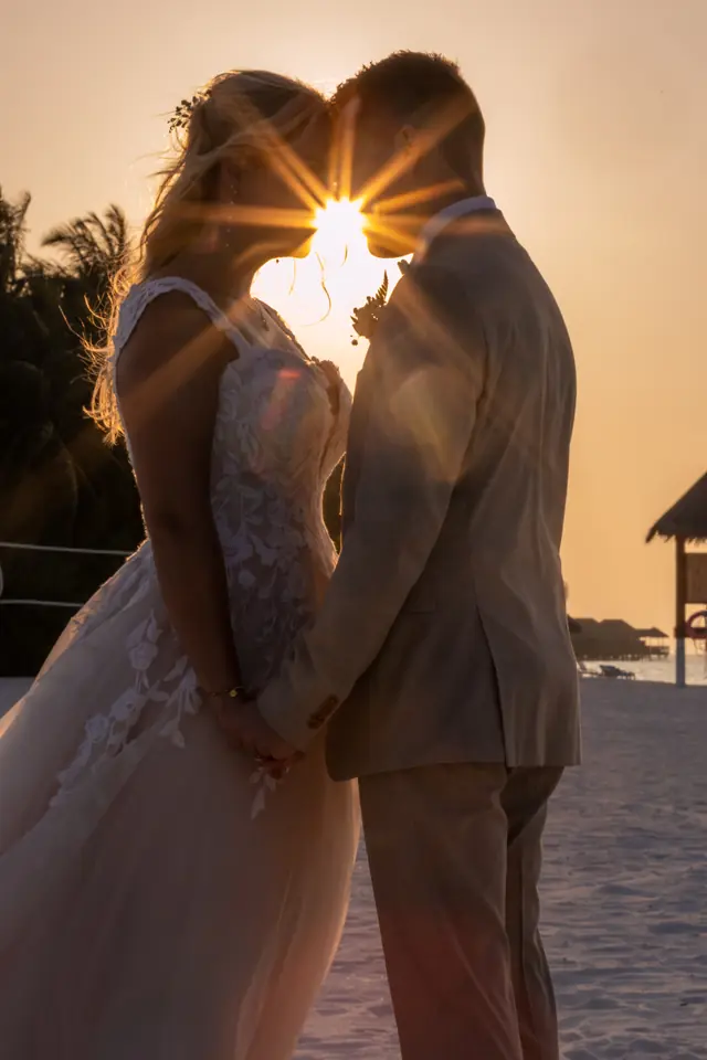 The sun between them — photograph by Ibrahim Ifaaz, Maldives