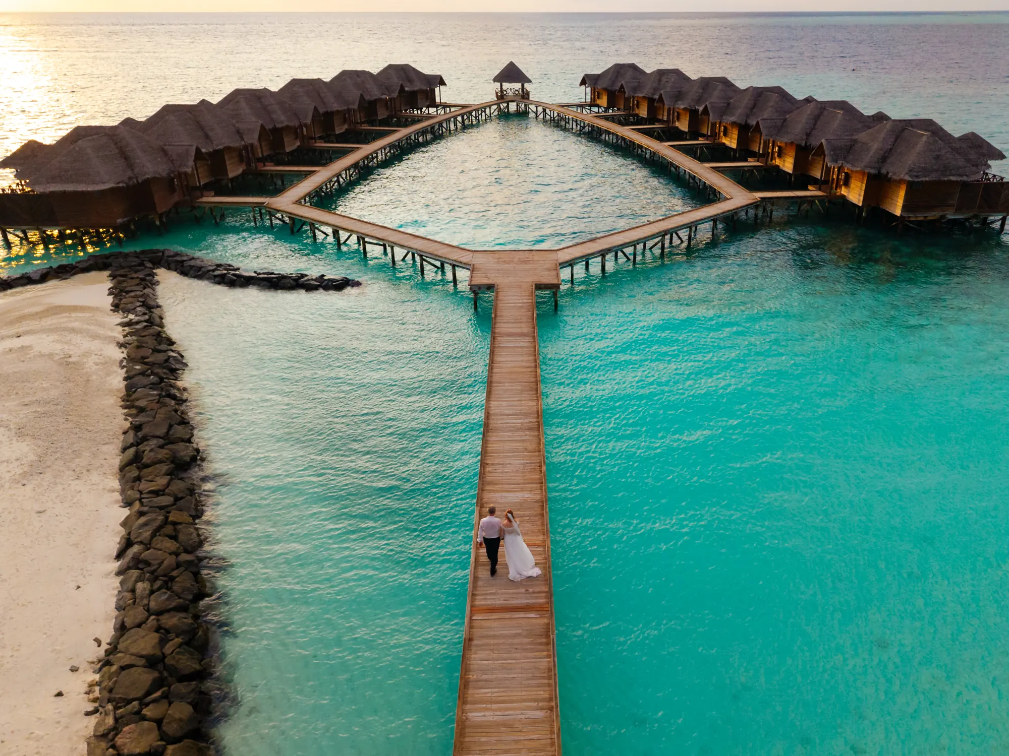 Overwater villas, above, photograph by Ibrahim Ifaaz, Maldives